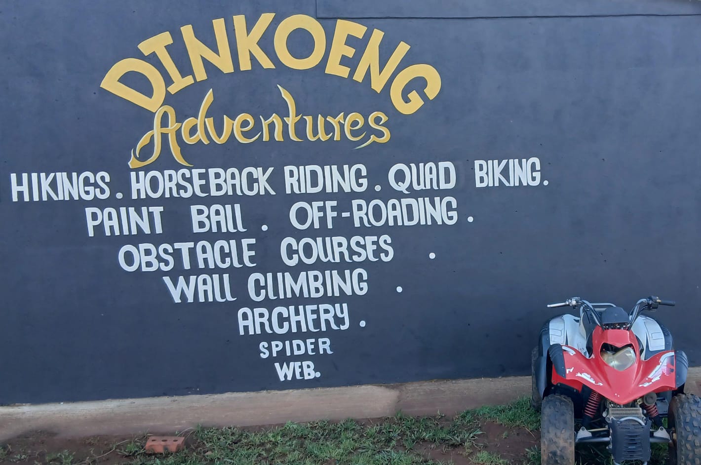 Dinkoeng Adventures sign with quad bike