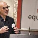 Man presenting at Equites Property Fund event