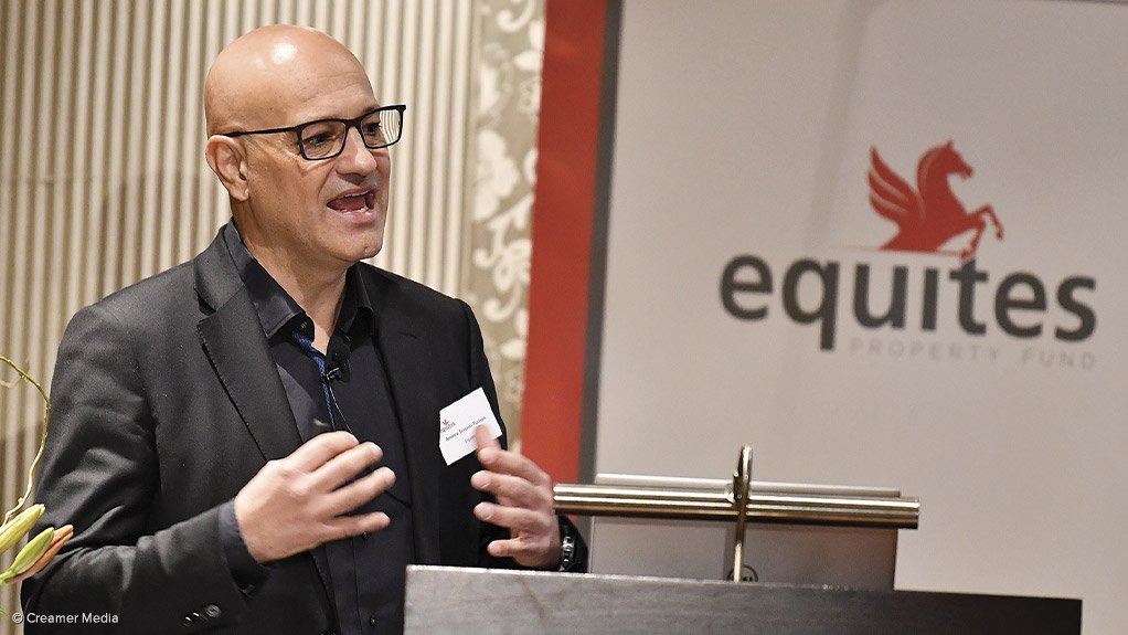 Man presenting at Equites Property Fund event