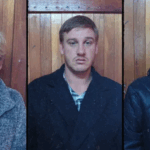 Three individuals against wooden background