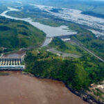 Aerial view of Congo River dam and landscape.