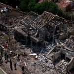 Collapsed buildings with debris after disaster