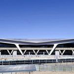Modern airport terminal with futuristic architecture.
