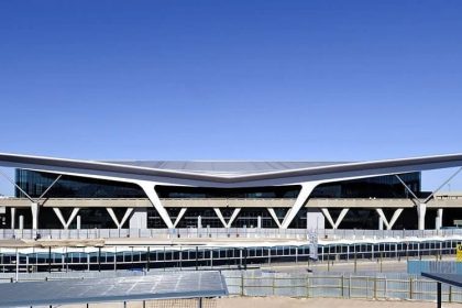 Modern airport terminal with futuristic architecture.
