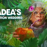 Madea sipping coconut in lush jungle setting