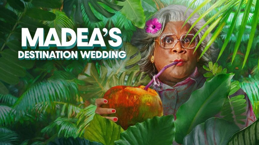 Madea sipping coconut in lush jungle setting