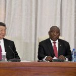 Two leaders in a diplomatic meeting, South Africa.