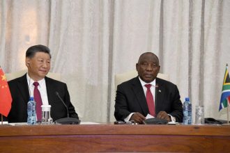 Two leaders in a diplomatic meeting, South Africa.