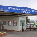 Tembisa Provincial Tertiary Hospital entrance with ambulance.