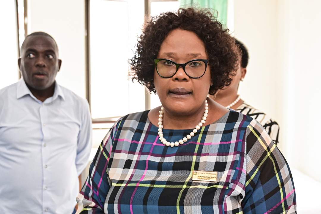 Professionals gathered in office setting, discussing important matters.