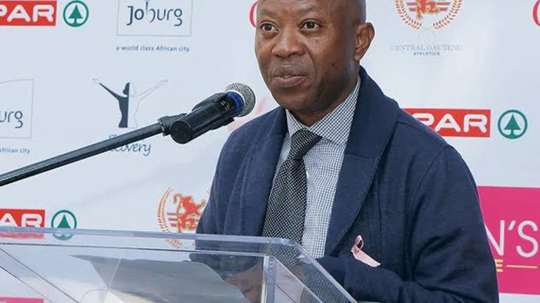 Man speaking at a Johannesburg event.