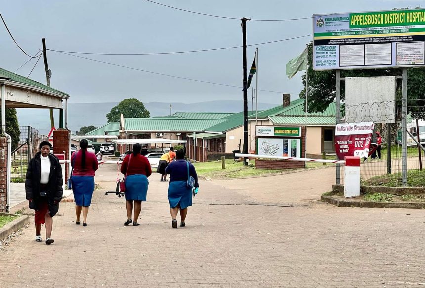 Appelsbosch District Hospital entrance with visitors walking.