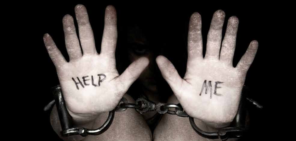 Hands in chains with 'Help Me' message.