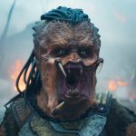 Alien creature roaring amid burning landscape