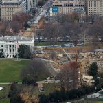 Aerial view of historic government building under renovation.