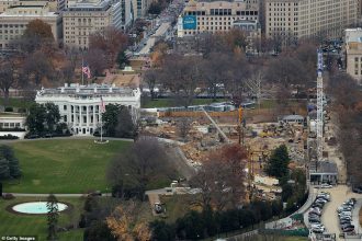 Aerial view of historic government building under renovation.