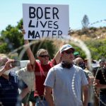 Protest with sign reading 'Boer Lives Matter'