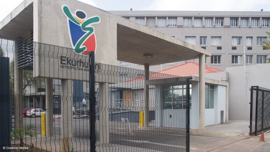 Ekurhuleni City entrance with logo and building view.