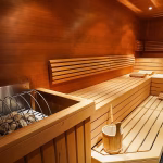 Husband and wife die after getting trapped in sauna fire 'due to faulty door handle'