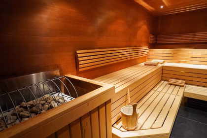 Husband and wife die after getting trapped in sauna fire 'due to faulty door handle'