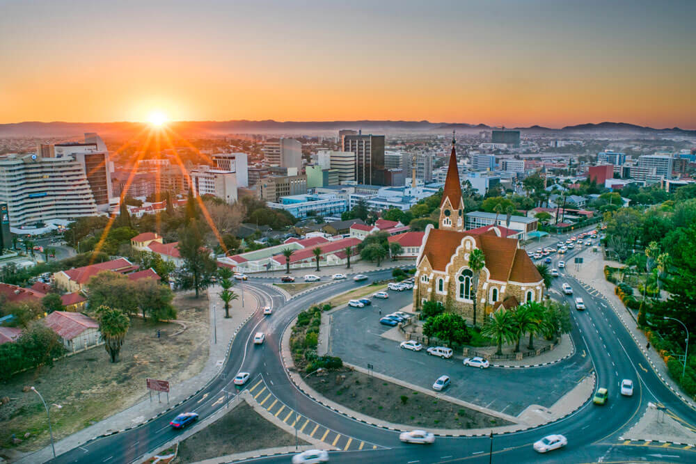 Windhoek cityscape at sunset with church view.