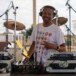 DJ Webster performing live on stage in South Africa during a house music set