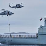 Danish forces would have to fight back against any invasion, the defence ministry said on Wednesday (AP)