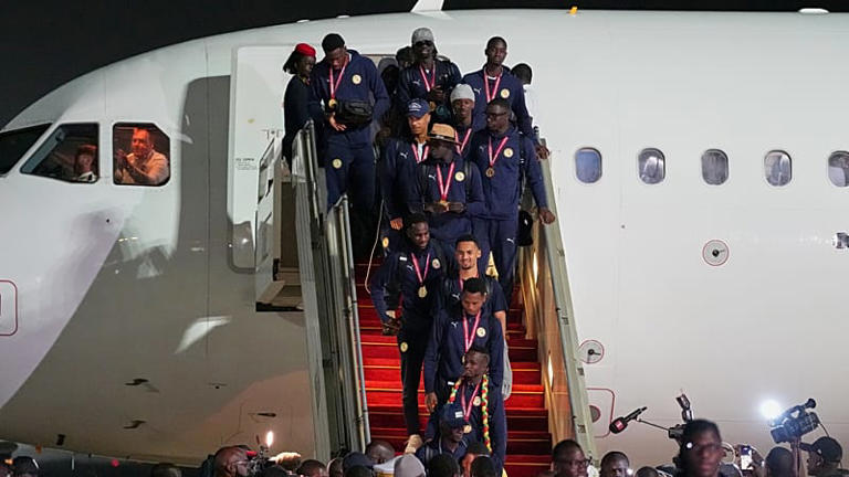 Senegal soccer team arrivse at the Blaise Diagne International Airport following their victory in the Africa Cup of Nations soccer tournamenat, Ndiass, Senegal, Jan. 30, 2026 © AP Photo
