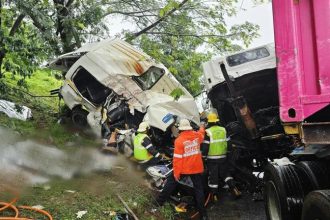 Taxi driver freed from wreckage