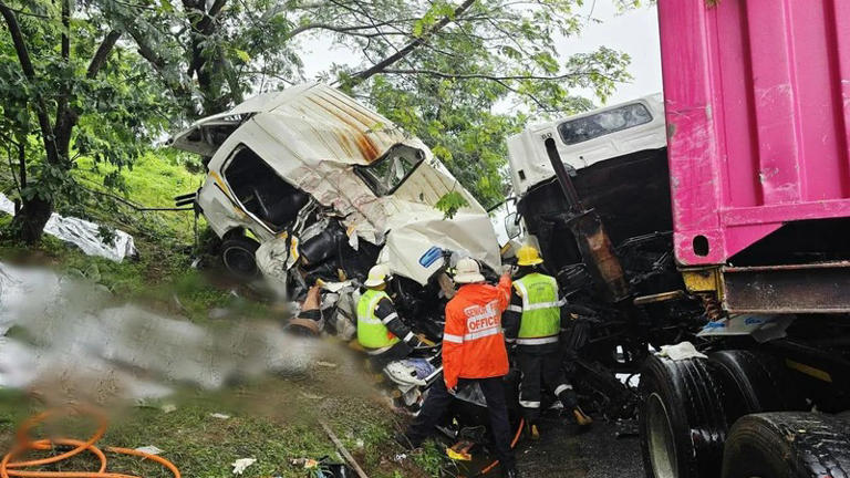 Taxi driver freed from wreckage