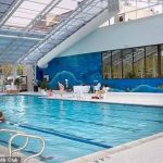 The unidentified girl died after being pulled from the water by her own sister before her mother was found at the bar