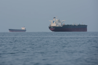 a tanker sits anchored in the strait of hormuz off the coast of qeshm island