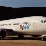 FlySafair passenger aircraft parked on airport tarmac