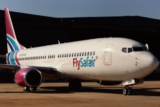 FlySafair passenger aircraft parked on airport tarmac