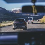 Cars driving on rural mountain road