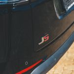 Close-up of LS badge on black SUV