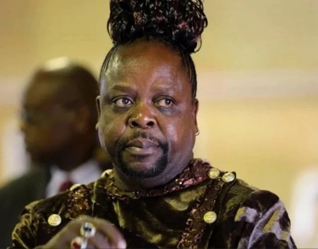 Man in traditional attire with styled hair