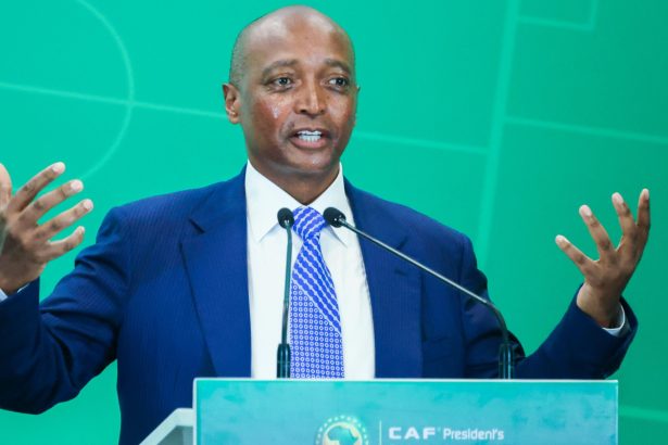 Man speaking at CAF podium