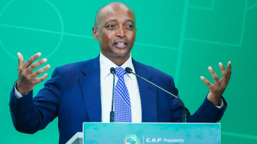 Man speaking at CAF podium
