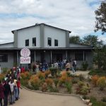 Children outside Good Work Foundation building