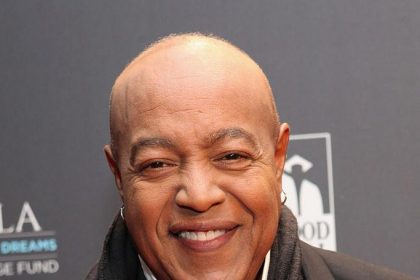 Smiling man in formal suit at event