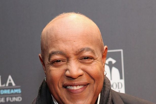 Smiling man in formal suit at event