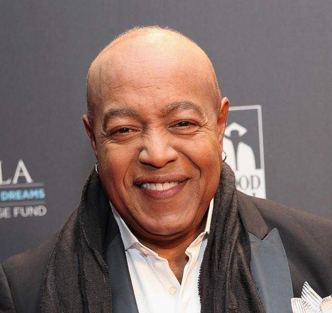 Smiling man in formal suit at event