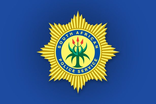 South African Police Service badge on blue background
