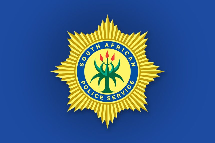 South African Police Service badge on blue background