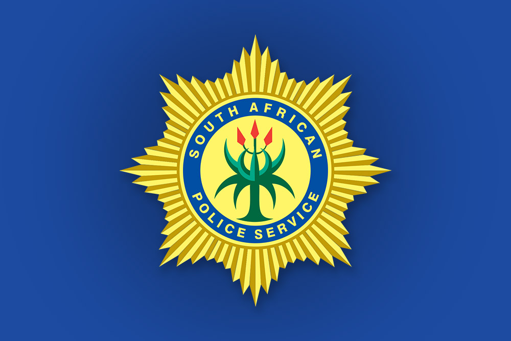 South African Police Service badge on blue background