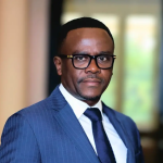 Professional man in blue suit and glasses
