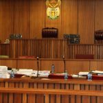 Empty South African courtroom with judge's bench