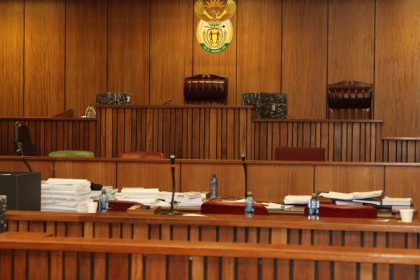 Empty South African courtroom with judge's bench