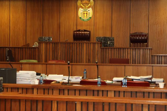 Empty South African courtroom with judge's bench